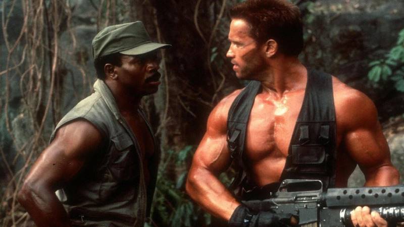 Carl Weathers e Arnold Schwarzenegger em "O Predador"